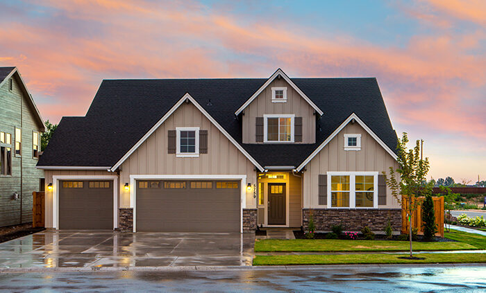 A house with wet pavement around it